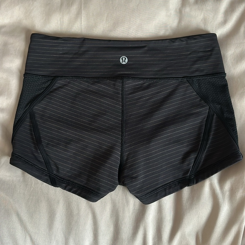 Lululemon Tight Short Shorts, Size 4, 
Black With Gold Pin Stripe